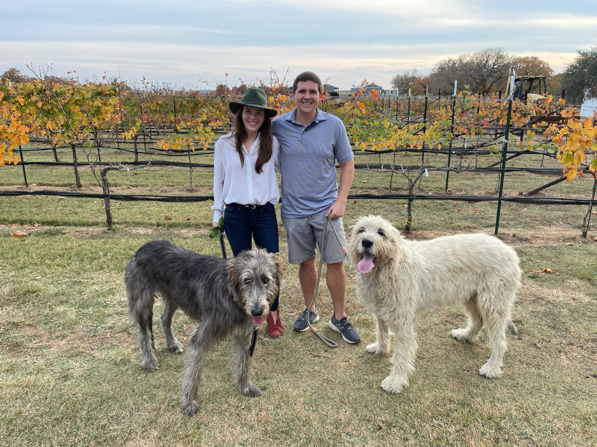 Georgina Buckley-Graham and Cody Graham with their dogs, Tildy and Theo.