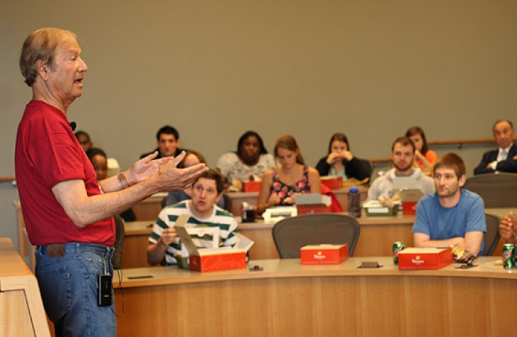 Lewis Katz speaks with students at the Lewis Katz Building in 2012