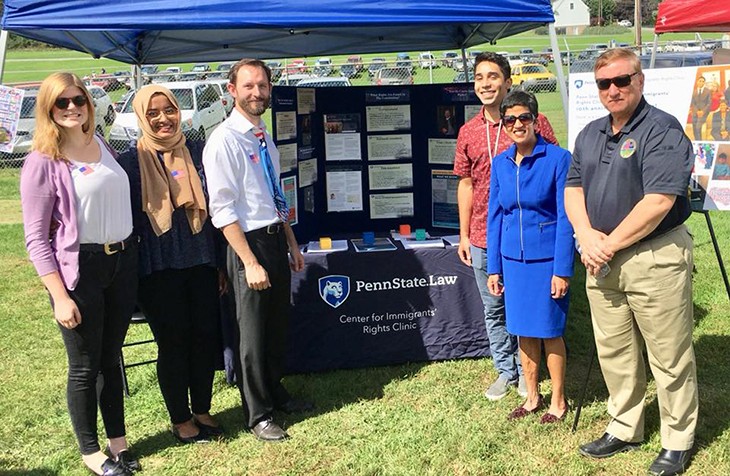 The Center for Immigrants' Rights Clinic set up a tent at the 2018 Constitution Day celebration.