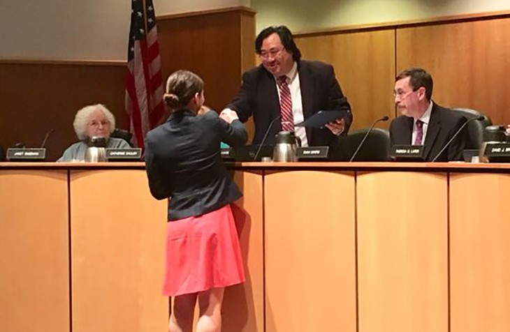 Penn State Law student Melissa Blanco shakes the hand of State College Mayor Don Hahn