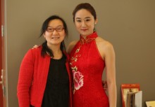 LL.M. Program coordinator, Jing Hu, poses for a photo with a law student in a traditional Chinese dress. 