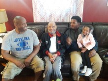 Carlton Baptiste with family members