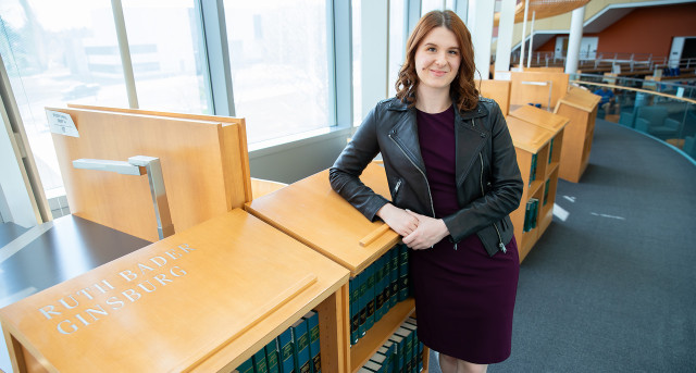 Cailyn Ann Teague in the H. Laddie Montague, Jr. Law Library at Penn State Law in University Park